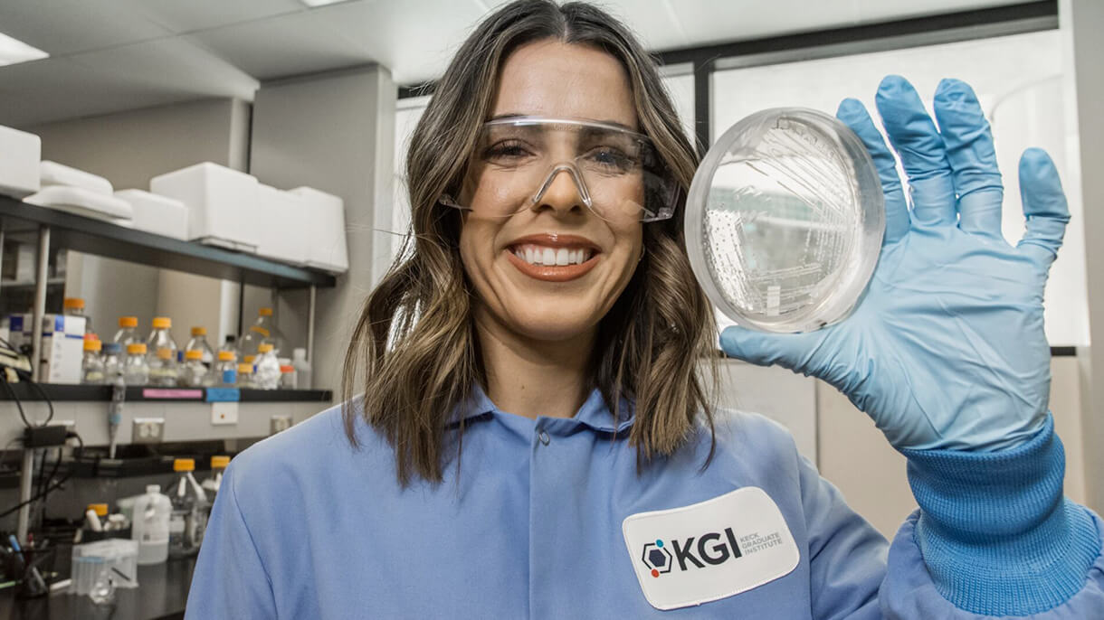 female KGI student with petri dish