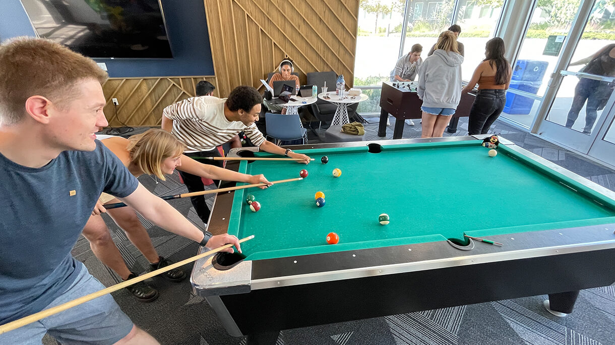 kgi students playing pool