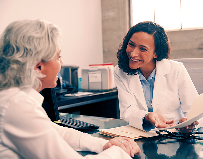 female doctor consulting patient